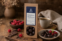 Schokolierte Himbeeren mit Zartbitterschokolade 80 g VEGAN in Papiertüte
