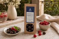 Schokolierte Himbeeren mit Zartbitterschokolade 80 g VEGAN in Papiertüte